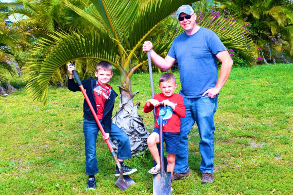 Me and boys planting palms 1